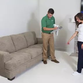 Chem-Dry technician analyzing carpet