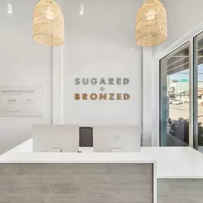 SUGARED + BRONZED The Heights reception desk