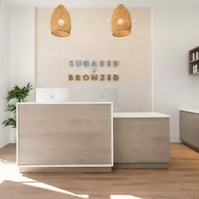 SUGARED + BRONZED Newport Beach reception desk