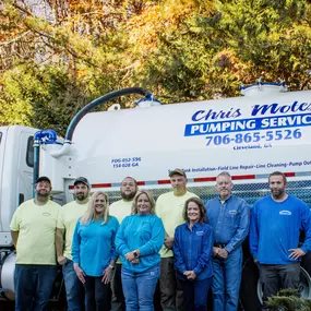 Chris Mote's Pumping Co Photo in front of a pump truck