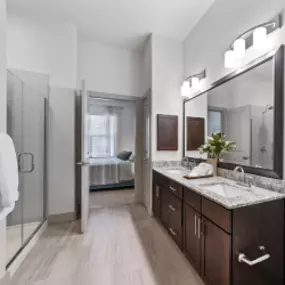 Bathroom with walk in shower & double sink vanity