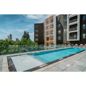 Rooftop pool with seating