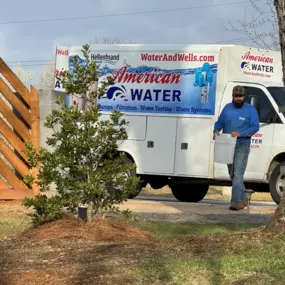 American Water Filtration Services Parked Truck Coming to the Well House