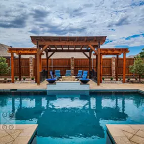 Extreme Exteriors Swimming Pool and Landscaping with Pergola