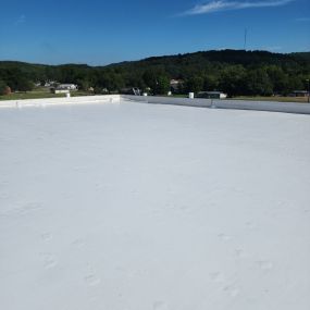 Look at this NEW Low Slope roof!
