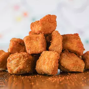 all white meat Chicken Breast, diced in bite size Chicken Nuggets, double fried in Beef Tallow. Choose one sauce - Coop Sauce, Ranch, Honey Mustard or BBQ.