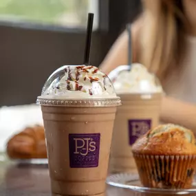 Get your iced coffee with a sweet treat on the side, such as a croissant or one of our muffins, all freshly baked in-house every day at PJ's Coffee on Braun Road in San Antonio, TX.