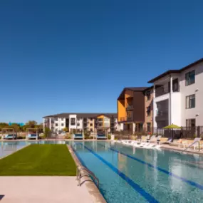 One of Two Resort-Style Pools with Sunbathing Decks