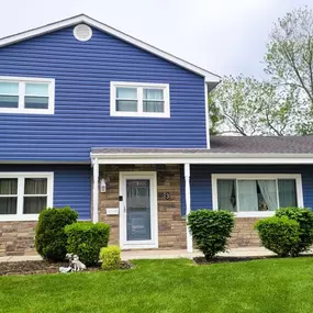 New vinyl siding and stone replacement