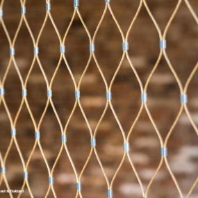 Stainless steel cable mesh in custom color gold for residential, commercial and industrial applications by Carl Stahl DecorCable.