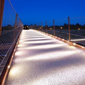 Pedestrian and bike bridge secured with stainless steel cable safety mesh from Carl Stahl DecorCable.