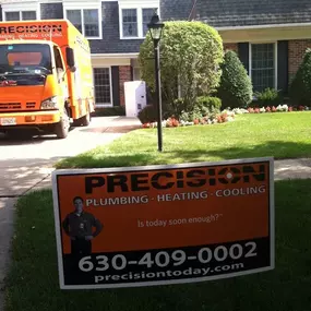 Precision Today Plumbing Heating Cooling Electrical sign outside of the house