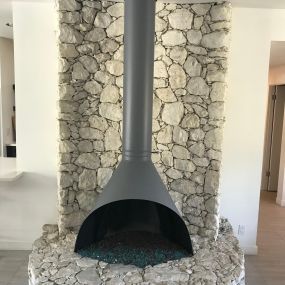 PosytModern designs is hot in Palm SpringsWe repainted the original 1960 fireplace