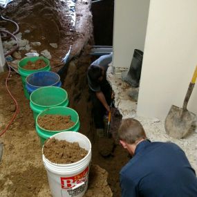 Sewer repair in floor - Jackhammer and excavate down to broken piping to replace.