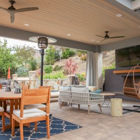 Cabana for dining and outdoor living room with fireplace