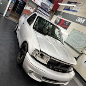 Dwraps performing a PPF (paint protection film) job on a truck for one of his clients.