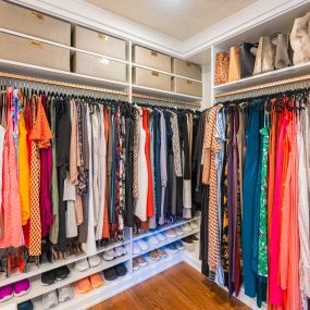 A custom closet with various hang lengths and shelf heights