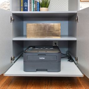 Pull out shelves to keep unsightly electronics out of sight