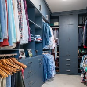 Midnight blue custom built-in closet cabinetry