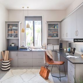 A home office with custom cabinetry