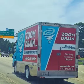 Zoom Drain truck en route to the next service in Humble!