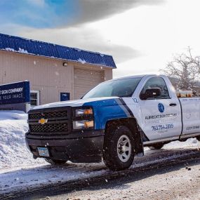 A snowy day outside Albrecht Sign Company.