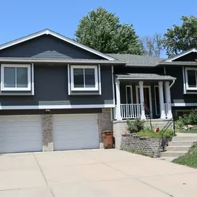 Bellevue, NE Exterior painting and siding repair. SuperPaint Exterior |  Body: SW 7068 Grizzle Gray | Trim: Super White