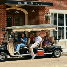 Golf-cart shuttle from The Oliver Hotel of Oxford to Ole Miss home games