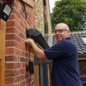 Here's Dan working with Matt to install a stunning  Fold Arm Awning  for a customer