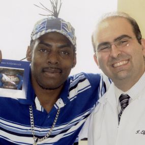 Coolio and Dr. Igal Elyassi at Wilshire Smile Studio