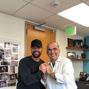 Ricky Martin and Dr. Igal Elyassi at Wilshire Smile Studio