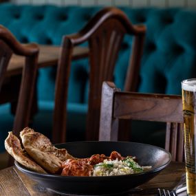 Classic chicken tikka masala, long grain rice, sourdough naan