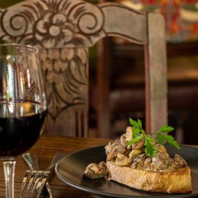 Pan-fried mushrooms, Stilton & garlic sauce, toasted sourdough.