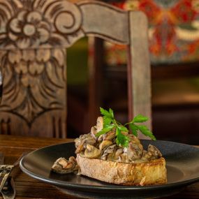 Pan-fried mushrooms, Stilton & garlic sauce, toasted sourdough.