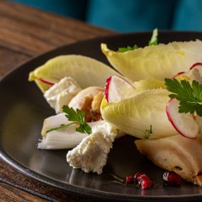 Poached pear salad, pomegranate, radish, walnuts and goats’ cheese.