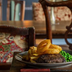 8oz rump, with skin-on chips, peas.