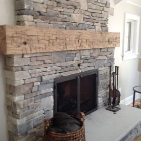 Look at this Fireplace! Displaying a massive Solid old Hand Hewn Reclaimed Beam for the Mantel!
Thank you for preserving a piece of Barn history!
Visit our showroom and see our fireplace mantels, Ceiling beams, Barnwood, reclaimed wood.