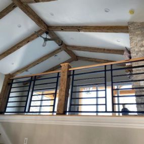 Reclaimed Beams, Hand hewn  Ceiling Beams are used for this stunning ceiling.
Reclaimed wood Beams accent the staircase. Using solid Beams for Newel Post and handrails with black iron Balusters.
Ohio