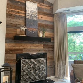 They did a great job picking out their Reclaimed wood for this fireplace wall. Using  mixed species of barn siding. They tied it together with a black mantel and firebox frame!