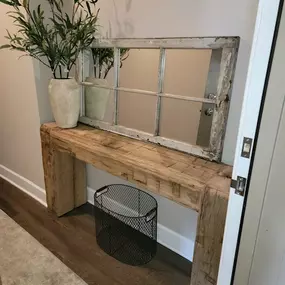 Custom built this reclaimed wood hall table using  hand hewn oak barn beams.