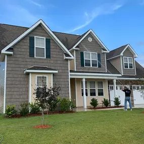 Waves Power Washing performing a whole house power washing service in Holly Ridge, NC.