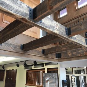 Large barnwood box beams: reclaimed wood beams adding rustic charm and architectural interest to ceilings and interiors.