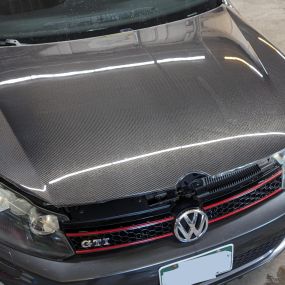 We polished and protected this carbon fiber hood with a full hood clear bra wrap on this 2010 Volkswagen Golf GTI