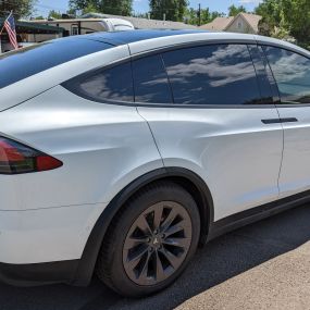 We did a chrome delete on this 2018 Tesla Model X with satin black vinyl.