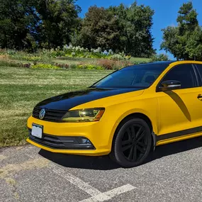 2017 Volkswagen Jetta SEL 1.8T MK6 vinyl wrap denver matte sonic yellow pearl kpmf with black accents sunlight front