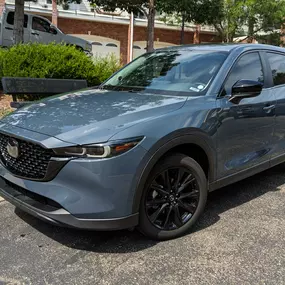 Window tint and partial front clear bra protection on this 2023 Mazda CX5 dat the customer's location in Lakewood