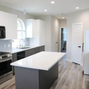 Kitchen remodel with granite countertops and vinyl floors
