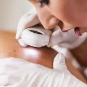 Desert Dermatology & Skin Cancer Specialists - DOC EXAMINING SKIN