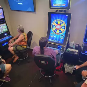 Close-up of a slot machine's spinning reels, capturing the anticipation of a winning combination.