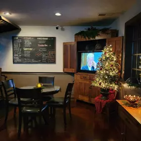 Cozy seating arrangements and chic decor at Lucky 7's Lounge in Somonauk, Illinois, providing a relaxed setting for guests.